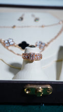 Necklace multiple chains cubic zirconia stone & pearl drop earrings.