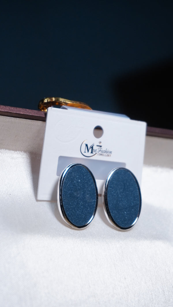 Black or very dark blue Earrings, central stone or enamel inlay, set within a silver-toned metal